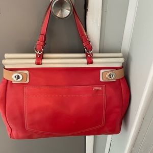 Red authentic coach bag with matching wallet.